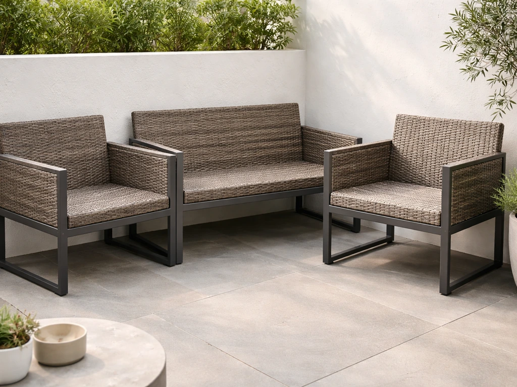 Minimal outdoor patio photo of an all-weather wicker conversation set on a powder-coated aluminum frame.