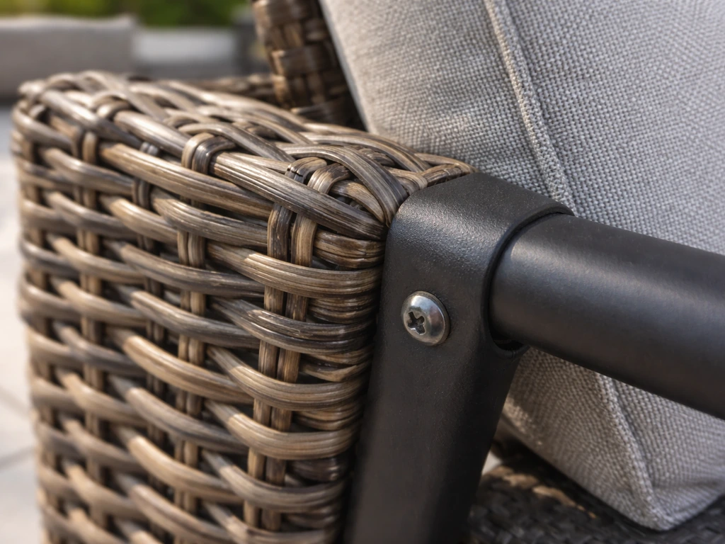 Close-up of wicker weave and powder-coated frame with Sunbrella cushion fabric texture