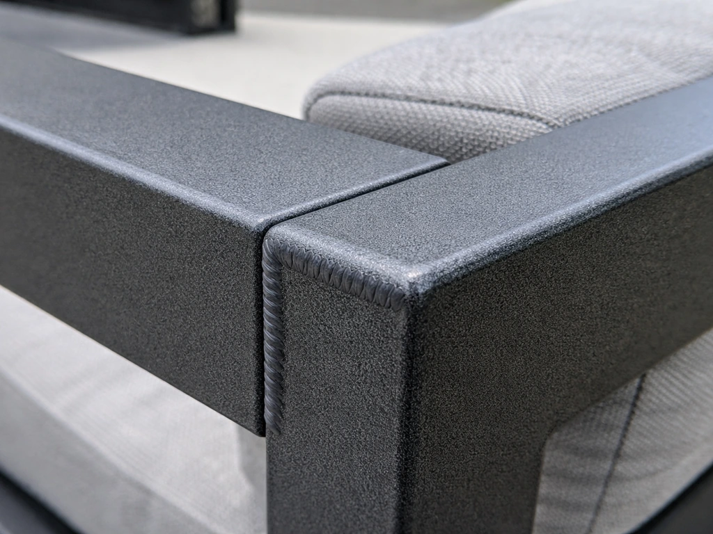 Close-up of a rust-resistant welded powder-coated aluminum outdoor furniture frame and joinery